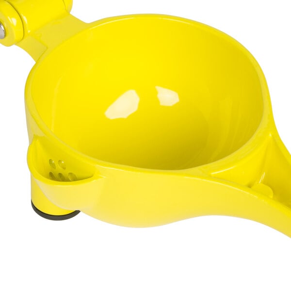 A yellow zinc alloy handheld lemon squeezer with a handle.