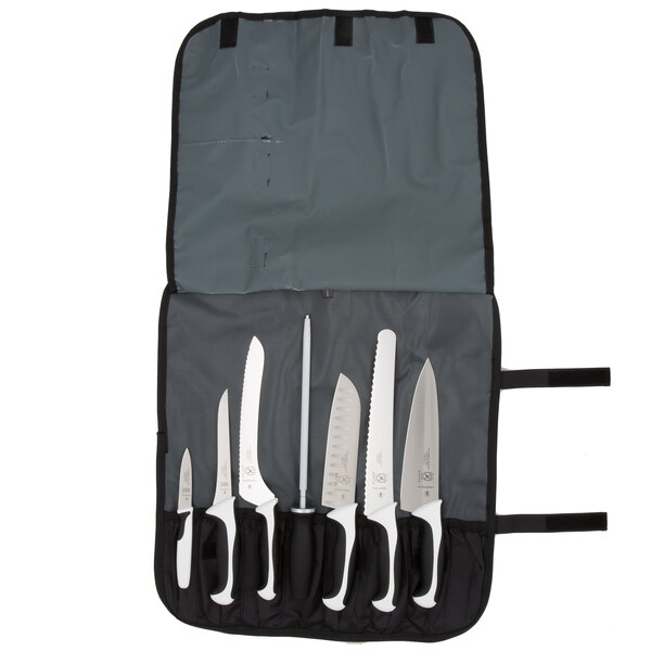 A Mercer Culinary Millennia® 8-piece knife set in a white bag.