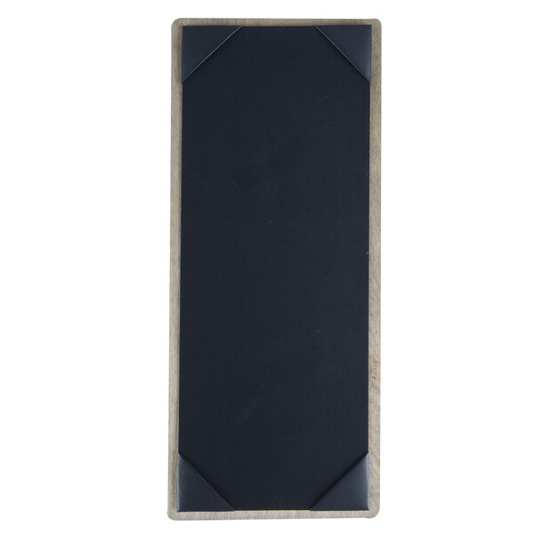 A rectangular black wood menu board with white corner strips.