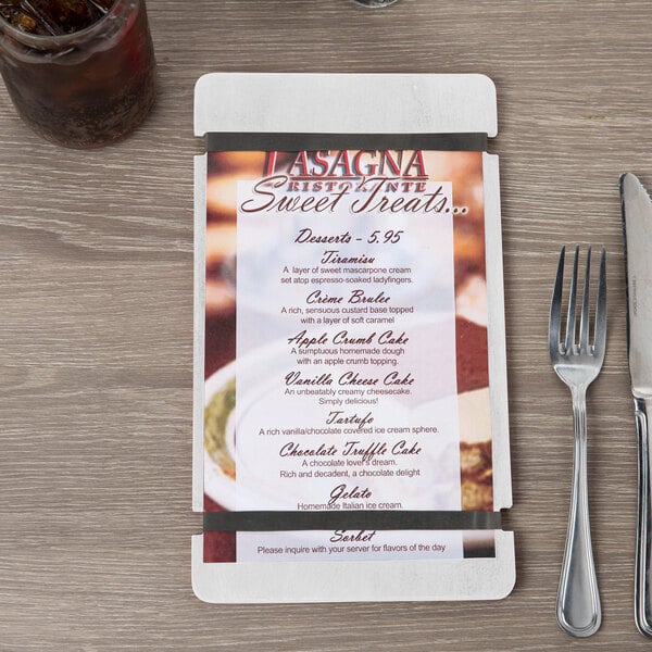 A Menu Solutions customizable wood menu board with rubber band straps on a table in an Italian restaurant.