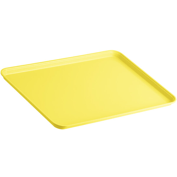A yellow Cambro market tray with a handle.