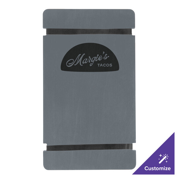 A gray wood menu board with rubber band straps on a counter with a business card and a menu with a black hat.