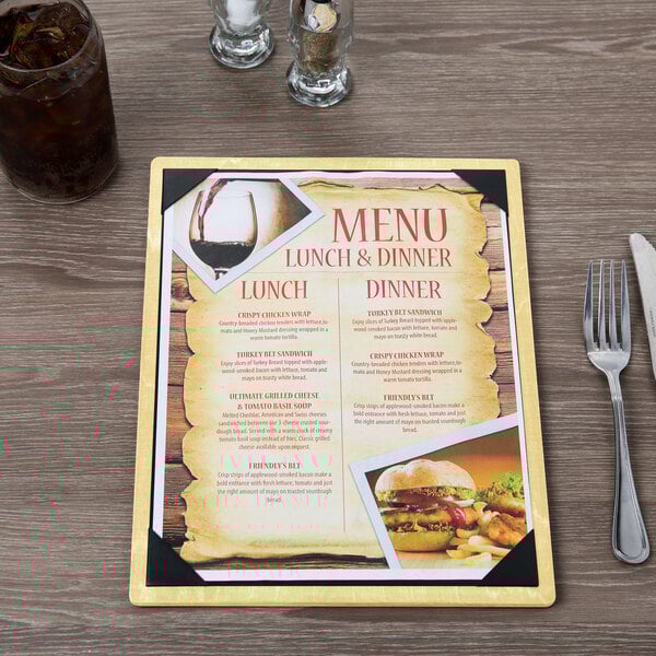 A Menu Solutions wood menu board on a table with a menu and a fork.