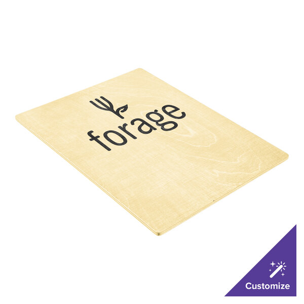 A close up of a Menu Solutions wood sign with black text on a table.