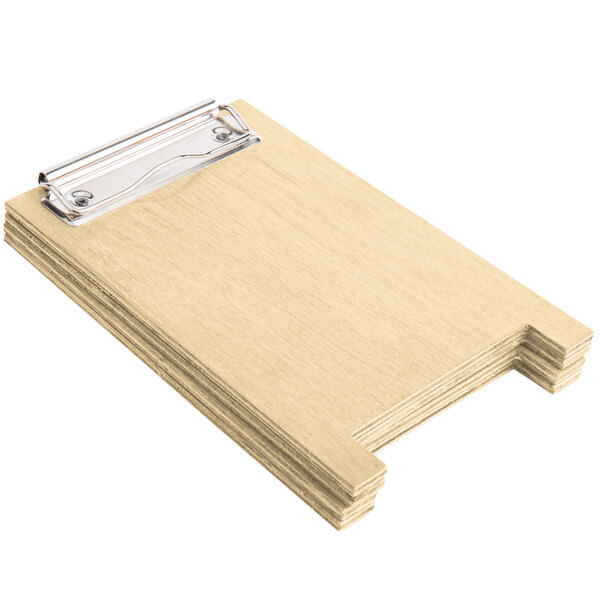 A natural wood menu board tent with a metal clip.