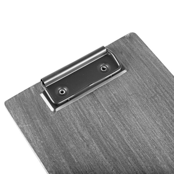 A Menu Solutions wood clipboard with a black metal clip.