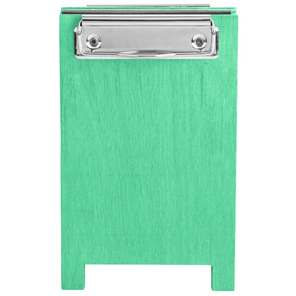 A Menu Solutions washed teal wood table tent with clip on a counter.