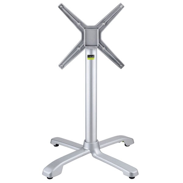 A silver FLAT Tech aluminum table base with an x-shaped stand.