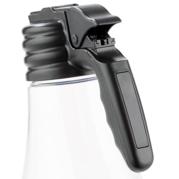 A clear plastic bottle with a black plastic dispenser tag handle.