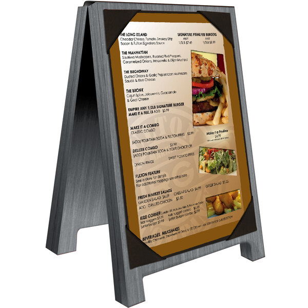 A Menu Solutions ash wood sandwich menu board tent with picture corners holding a menu with a picture of a burger.