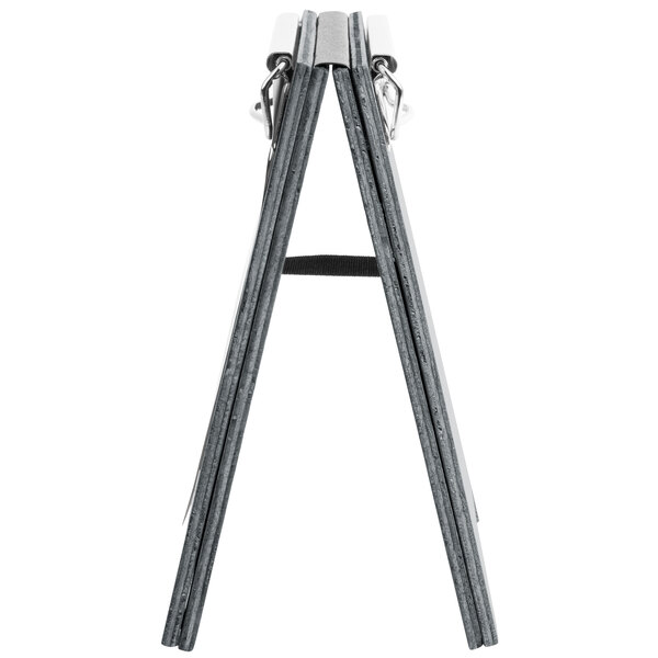 A close-up of a Menu Solutions Ash Wood Menu Board with a black clip.