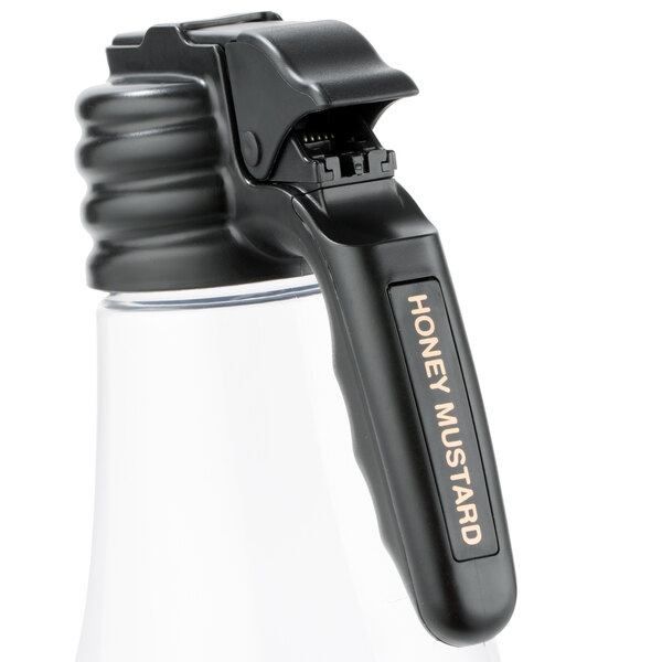 A black plastic bottle with a black handle and white "Honey Mustard" print.