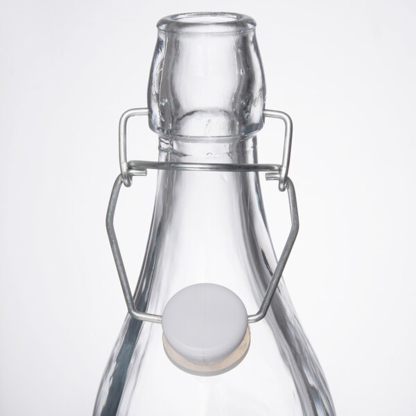 Acopa 35 oz. Clear Glass Bottle with Wire Bail Swing Top Lid - 12/Case