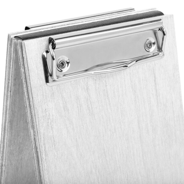 A white wash wood sandwich menu board tent with a metal clip.