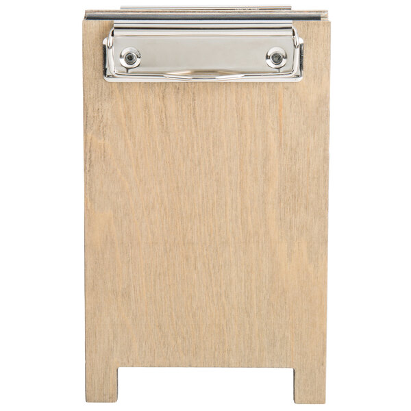 A wood menu board tent with a clip.