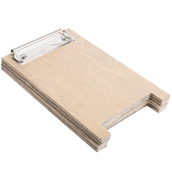 A weathered walnut wood sandwich menu board tent with a metal clip.