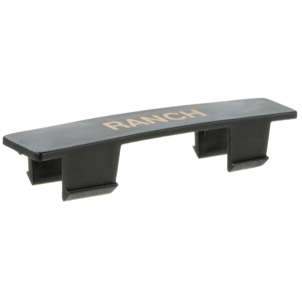A black rectangular Tablecraft dispenser tag with orange "Ranch" text.