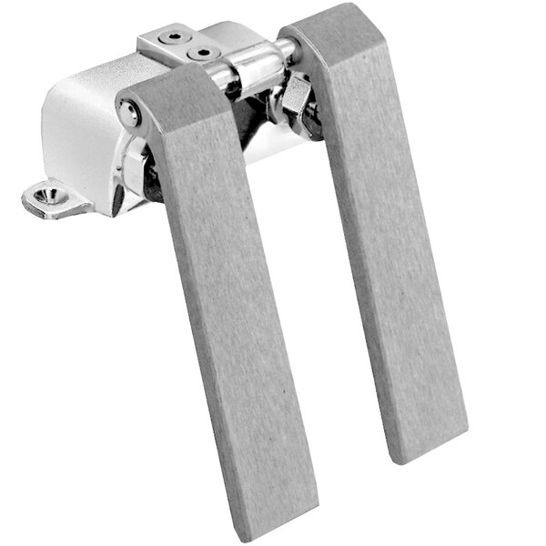 A close-up of a Fisher stainless steel dual knee valve with two metal handles.