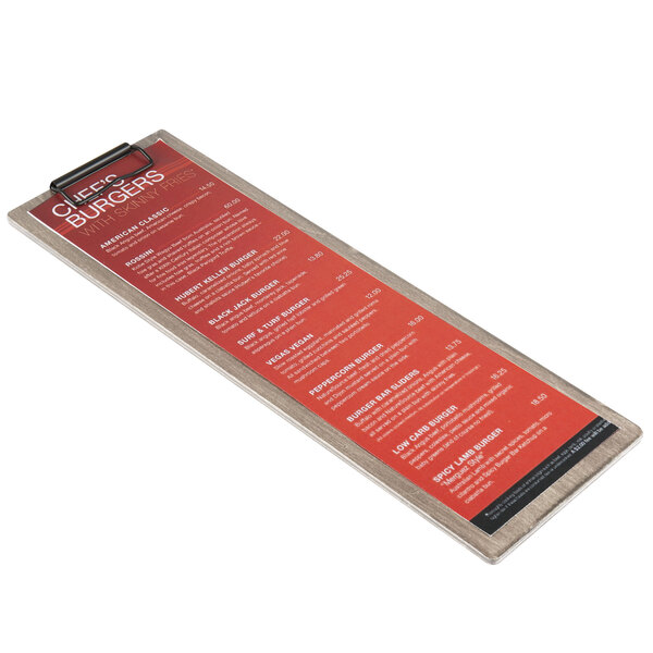 A weathered walnut wood clipboard with a menu on it.