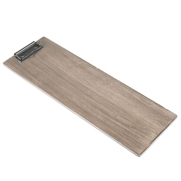 A Menu Solutions weathered walnut wood clipboard with a metal clip.