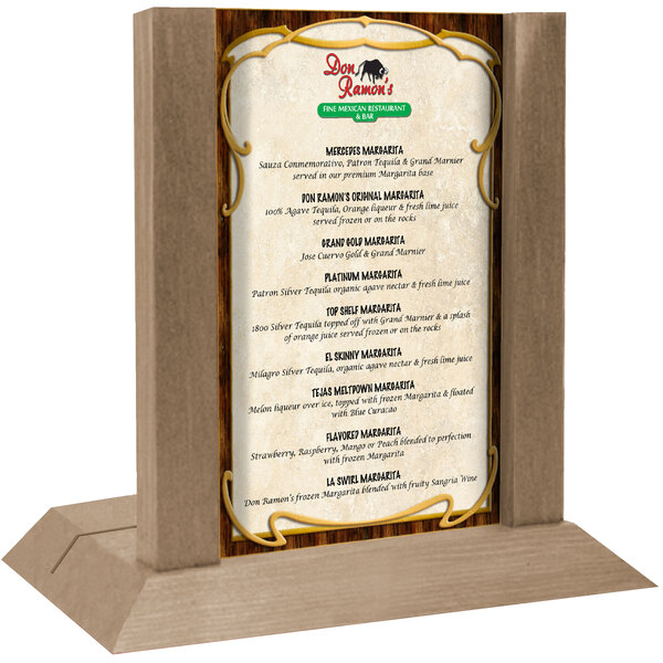 A Menu Solutions weathered walnut wood menu holder on a table with a menu in it.