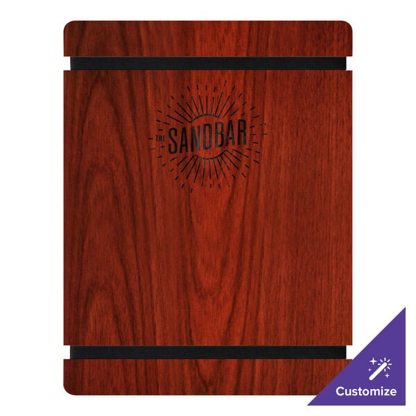 A mahogany wood menu board with rubber band straps on a table in a bar.