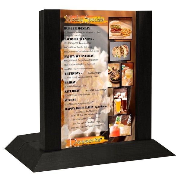 A black wood Menu Solutions table tent with a menu on it.