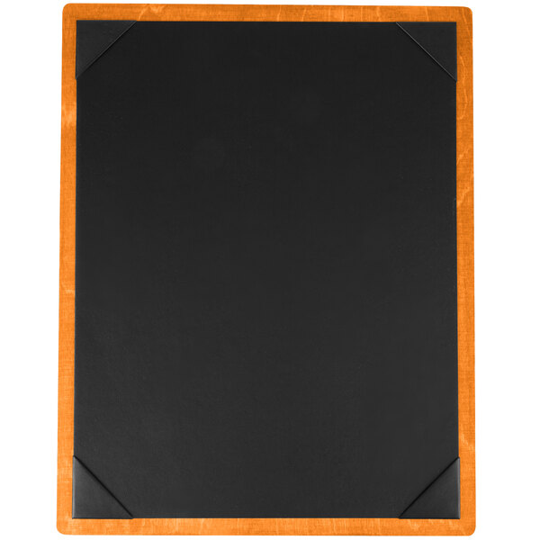 A black rectangular wood menu board with orange corners.