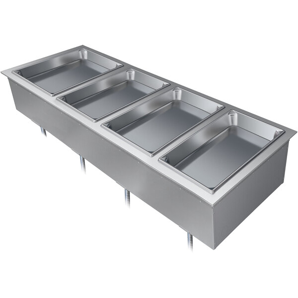 A Hatco drop-in hot food well with four rectangular stainless steel compartments.