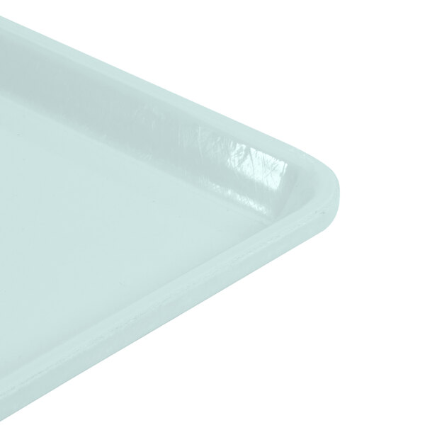 A close up of a sky blue Cambro dietary tray.