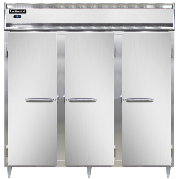 The open door of a Continental solid door reach-in refrigerator.