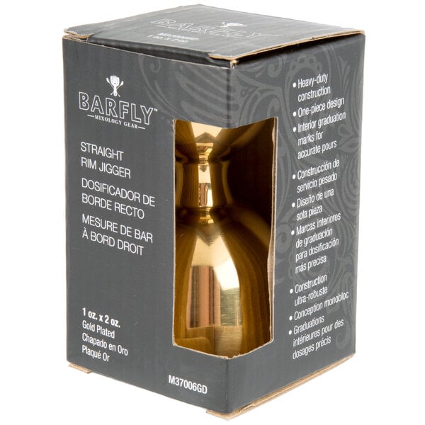 A gold metal Barfly bell jigger in a box.