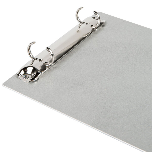 A Menu Solutions Alumitique aluminum menu board with two metal rings.