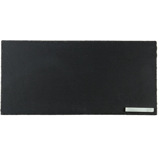 A black rectangular slate tray with a soapstone chalk.