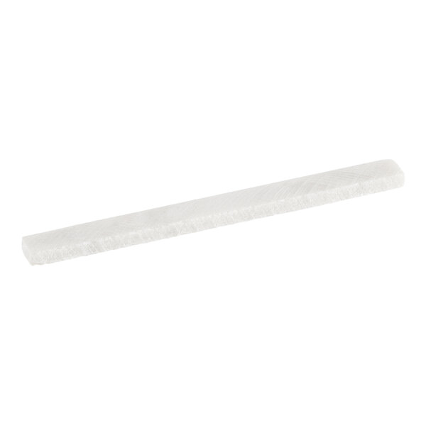 A single white soapstone chalk stick for writing on slate trays.