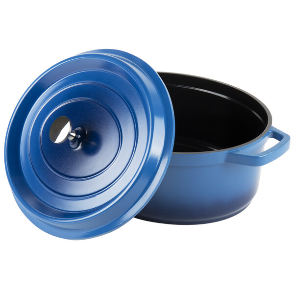 A cobalt blue oval Dutch oven with a lid.