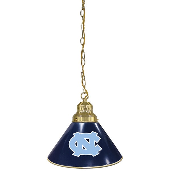 A brass pendant light with a blue and gold University of North Carolina logo.