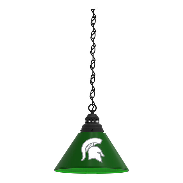 A green lamp shade with a white Michigan State University helmet on it.