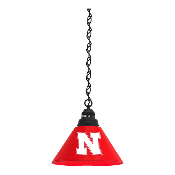 A black pendant light with the University of Nebraska logo in red and white.