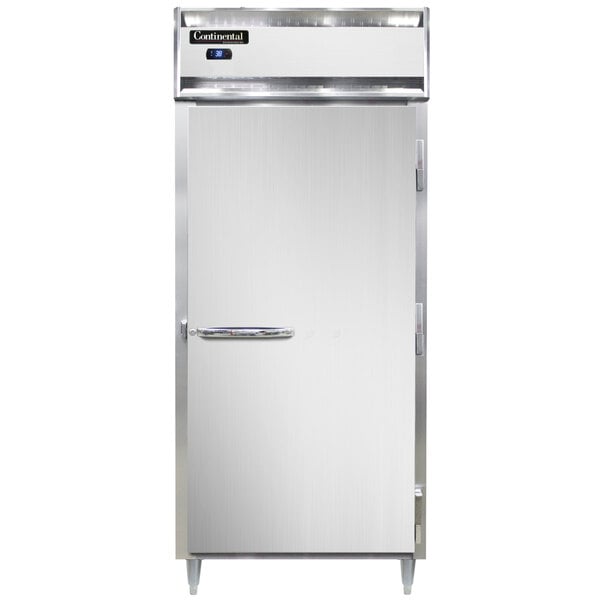 A white Continental reach-in refrigerator with a white door and a silver handle.