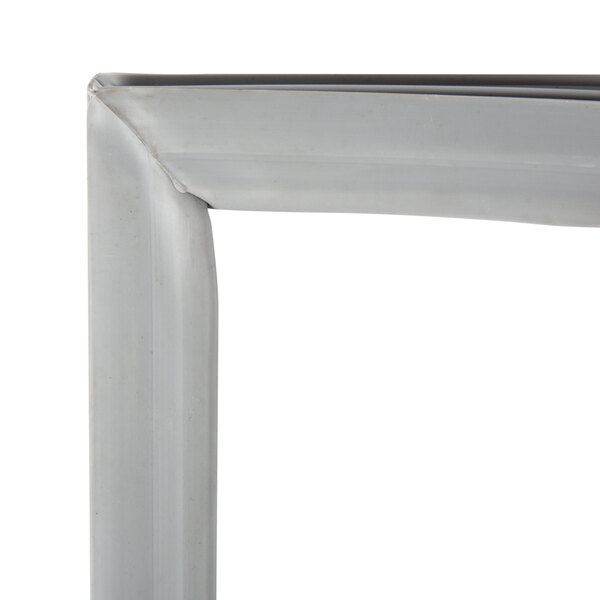 A close up of a white metal frame corner for an Avantco magnetic drawer gasket.