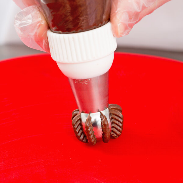 A close-up of an Ateco Russian ball tip pastry tip.