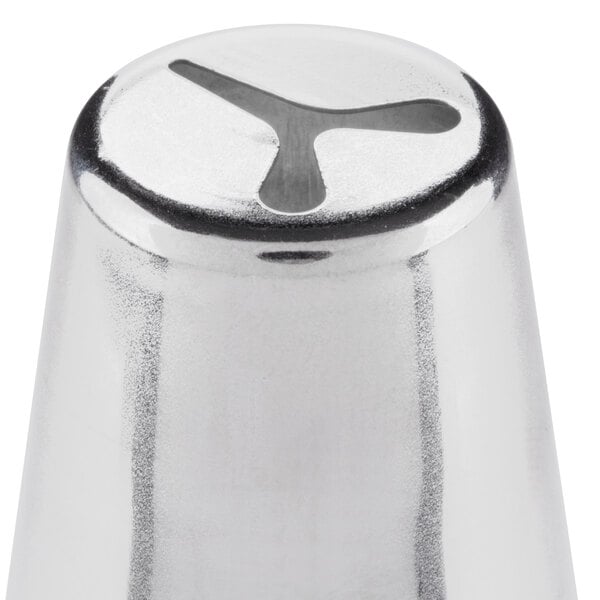 A silver metal Ateco heart piping tip with a small hole in it.