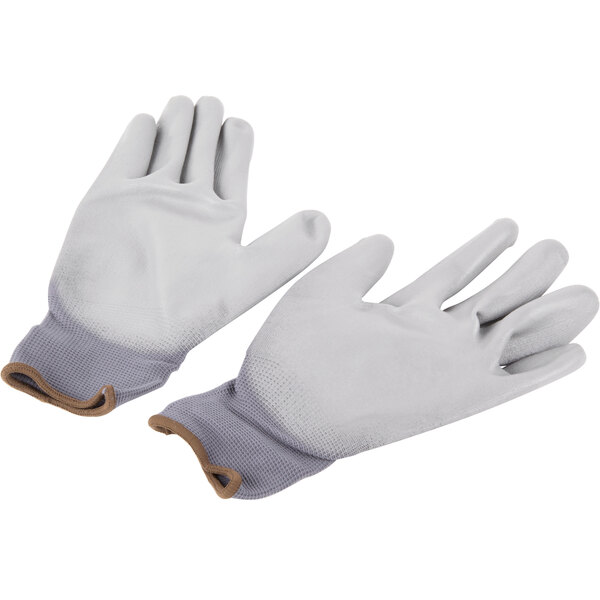 A pack of white Cordova nylon gloves with gray polyurethane palms.