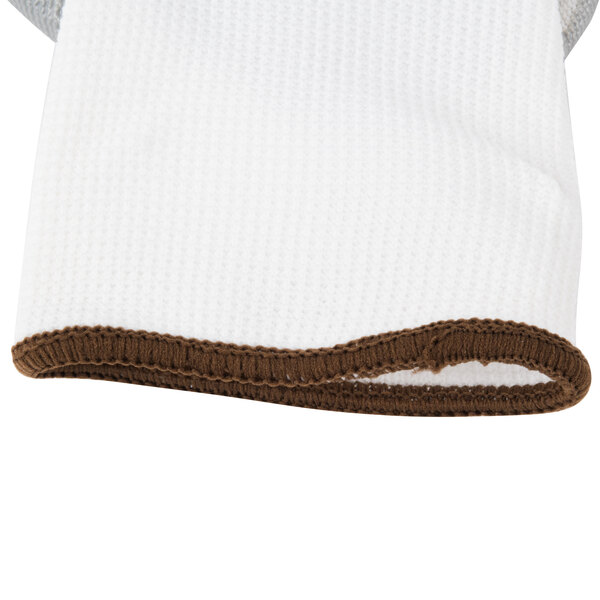 A white Cordova Cor-Touch II glove with gray palm coating.