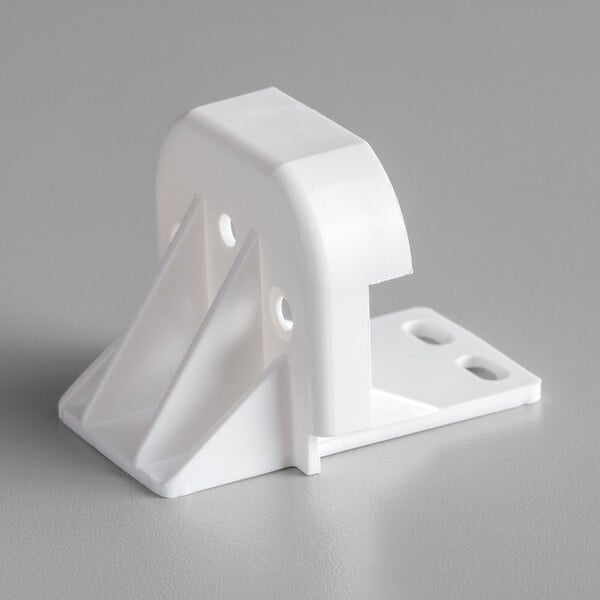 A white plastic True lampholder base bracket with holes.