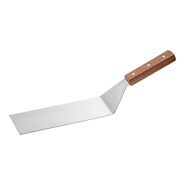 An American Metalcraft solid turner with a wooden handle.