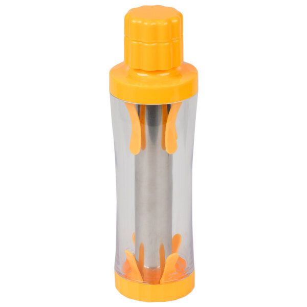 A Weston corn stripper with a yellow and orange plastic container.