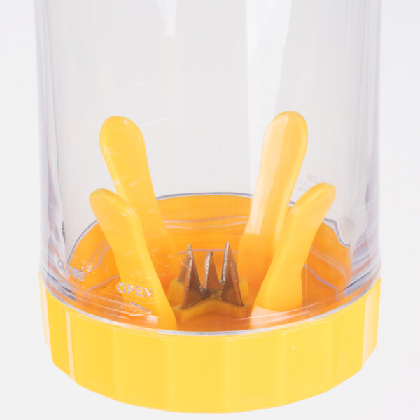 A yellow and clear plastic container with yellow handles on a Weston corn stripper.