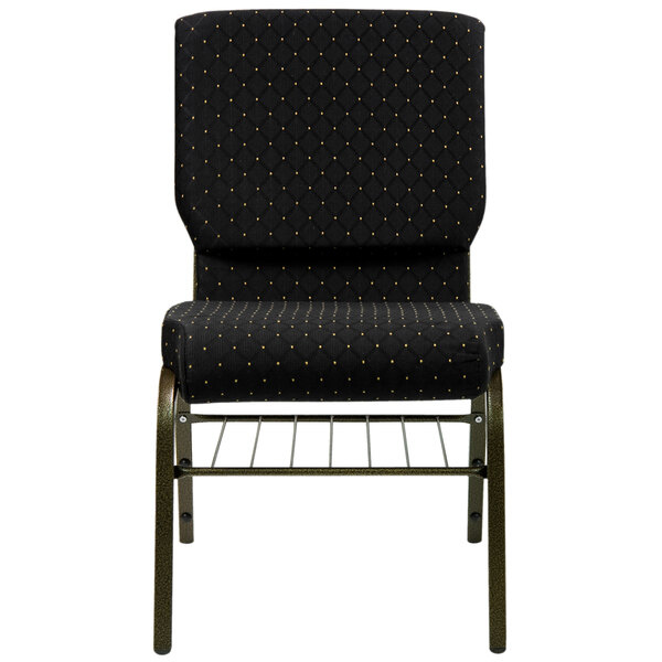 A black church chair with a gold metal frame and black dots.